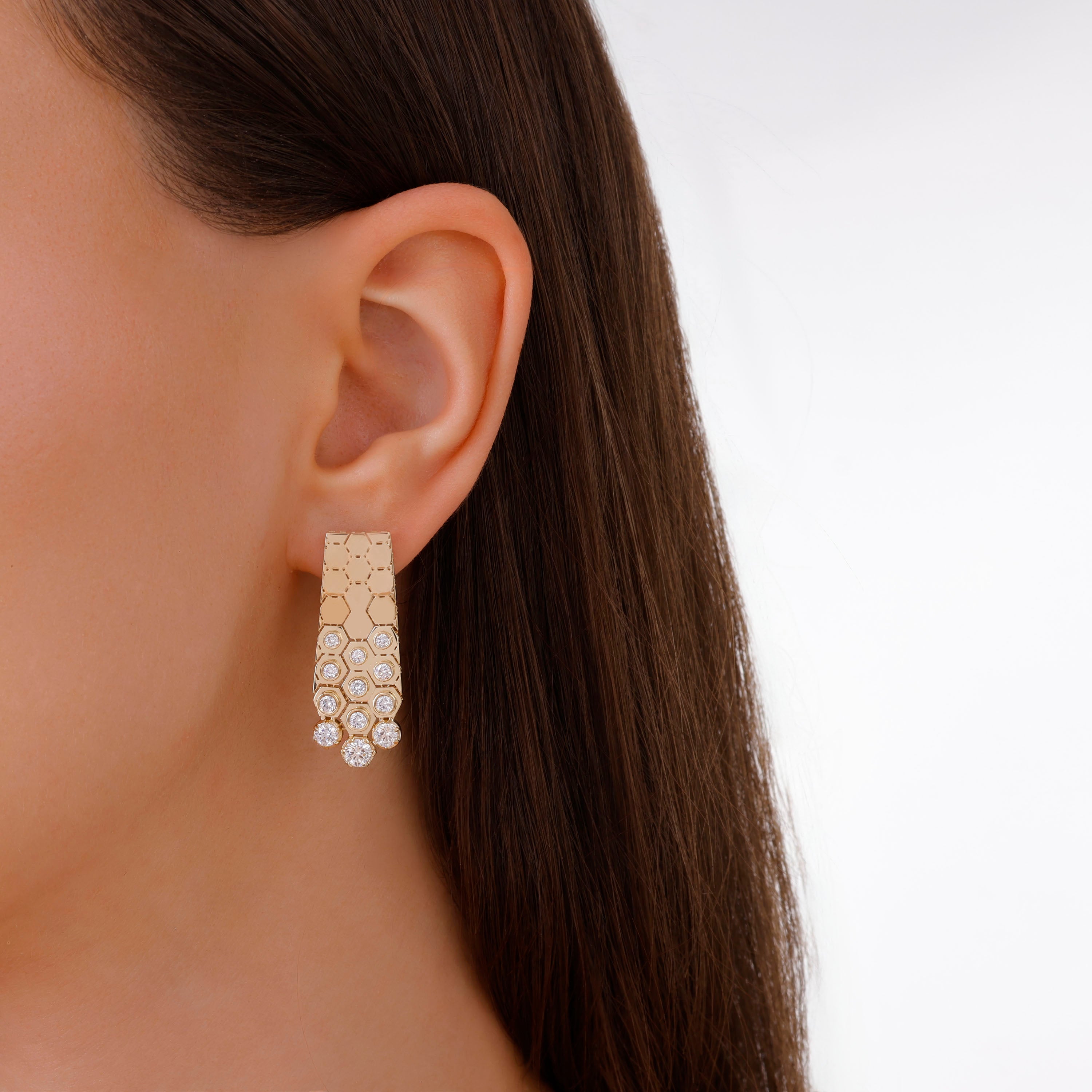 Gold earrings with diamond accents